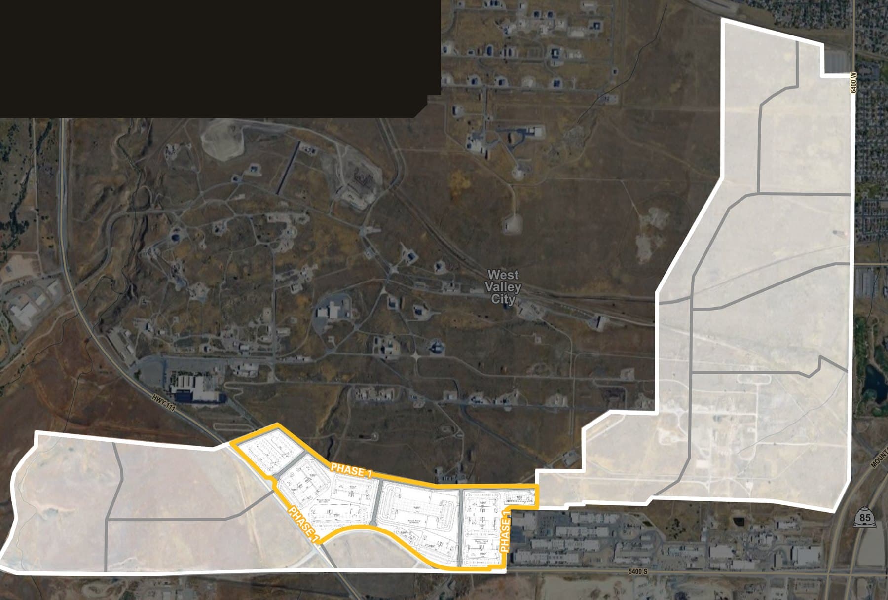 Aerial plan of Project Hive. A white boundary encloses the whole of the roughly 900-acre master plan, from the northern parcel down and west across the southern parcel. Within it, a honey-coloured boundary marks the roughly 109 acres of Phase 1 along the southern edge, with a preliminary site plan drawn inside.
